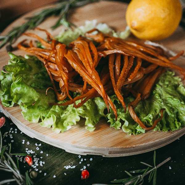 Щупальца кальмара холодного копчения